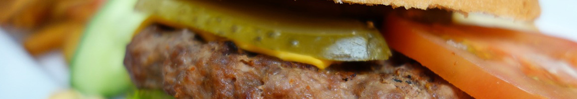 Eating American (Traditional) Burger at Friendly Stop Bar & Grill restaurant in Cincinnati, OH.